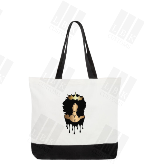 White tote with black handles featuring queen with a crown