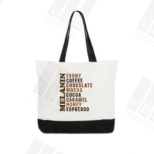 Tote with melanin colors in text with black handle and black base.