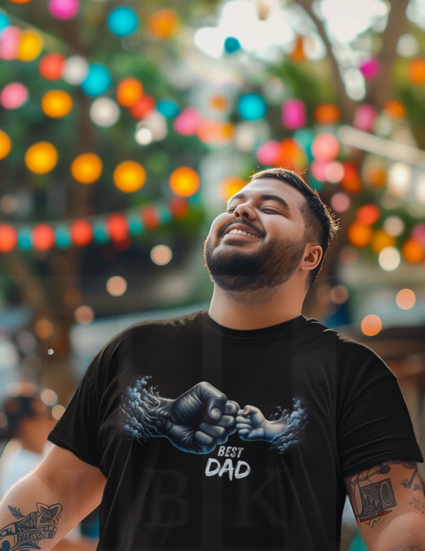 man smiling wearing a black shirt